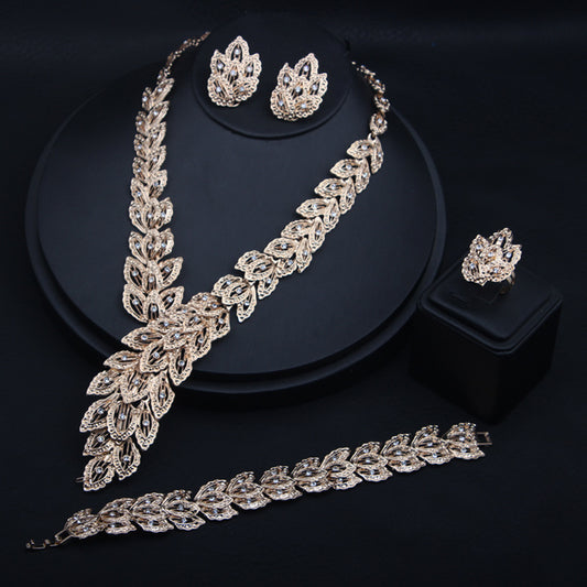 4PCS Gold Color Rhinestone Peacock Feather Necklaces Earrings Bracelet Rings Bridal Jewelry Sets Dubai Women Wedding Accessories