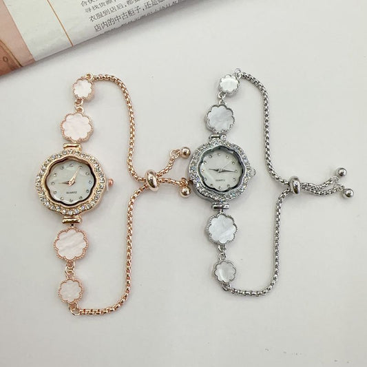 Light luxury, niche temperament, diamond-encrusted flower-shaped drawstring bracelet watch