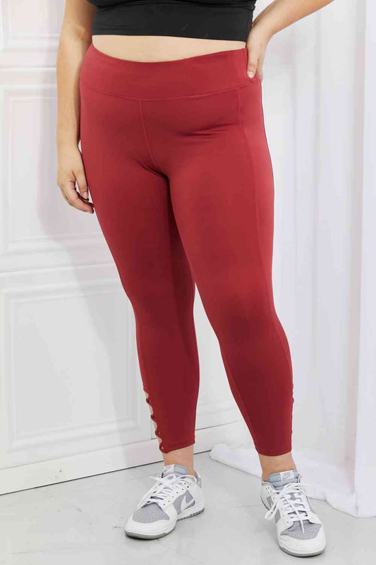 Women's Yelete Ready For Action Full Size Ankle Cutout Active Leggings in Brick Red